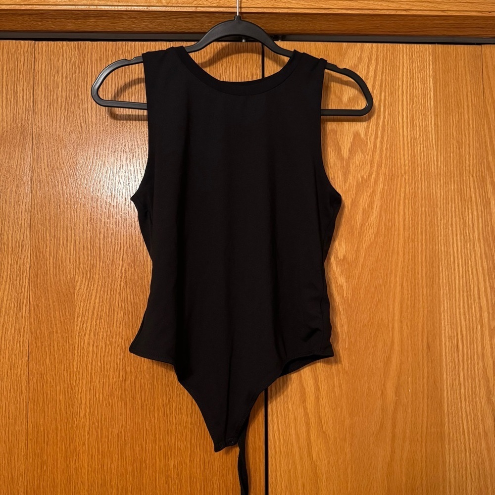 House of Harlow black Sleeveless Bodysuit
NWOT